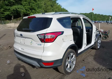 2017 Ford Escape Titanium z USA, uszkodzony, nr VIN 1FMCU9JD3HUD80510